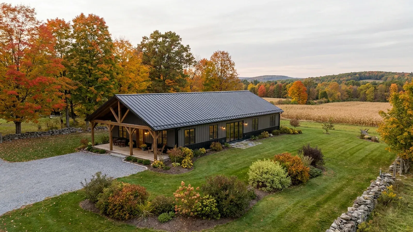 A completed single-story barndominium with a long, low roofline and no upper-level windows.